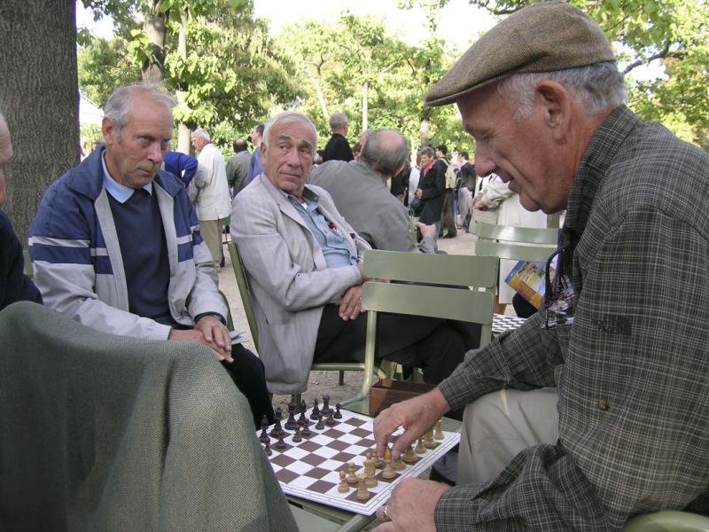 Marty playiing chess in Luxembourg gardens - Marty playing chess at  Luxoumberg gardens ©2004 Martin Oretsky